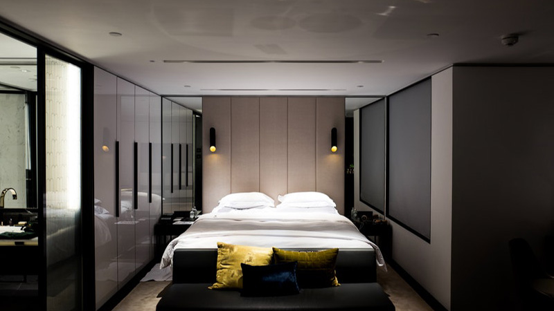 bed with white bed sheet and pillowcase set